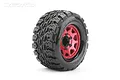 A single Jetko 2.8 inch King Cobra MT monster truck tire mounted on a red metallic multi-spoke wheel against a white background.