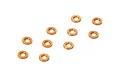 Ten small orange anodized aluminium shims arranged on a white background.