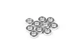 A cluster of ten small silver aluminium shims or spacers for RC cars, arranged on a plain white background.