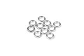 A cluster of ten small silver-coloured aluminium shims or washers arranged on a plain white background.