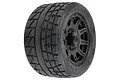 Pro-Line 3.8 inch Menace HP MT belted tyre pre-mounted on a black Raid rim, viewed from a three-quarter angle.