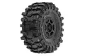 A single Pro-Line 1.9 inch Mickey Thompson Baja Pro X G8 tyre mounted on a black Holcomb beadlock rim, shown against a white background.