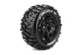 A single Louise X-Mallet RC monster truck tyre mounted on a black spoked plastic rim, featuring aggressive tread patterns and white sidewall branding.