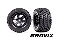 Two Traxxas Gravix RC monster truck wheels with black rims and aggressive tread patterns, shown from front and side angles against a white background.