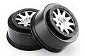 A pair of HPI Blitz Mk.10 V2 RC short course wheels featuring matte black barrels and silver multi-spoke centers with black beadlock-style detailing.