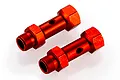Two red anodized aluminium front double axle extenders for RC cars on a white background.
