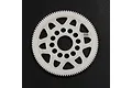 A white Delrin 98T 64dp spur gear for RC cars, featuring a lightweight design with circular and triangular cutouts.