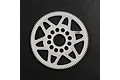 A white Delrin 108T spur gear for RC cars, featuring a spoked design and central mounting holes, set against a dark textured background.