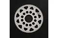 A white Delrin 84T spur gear for RC cars, featuring a circular design with multiple cutouts and the number 84 printed on the surface.