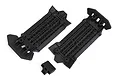 Two black plastic Traxxas skid plates and one small separate black plastic component on a white background.
