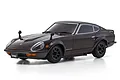 A studio shot of a maroon Kyosho Mini-Z Nissan Fairlady 240ZG RC car on a white background.