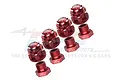 A set of red anodized aluminium wheel hexes and locking nuts for RC cars, featuring GPM branding and 7075 alloy markings.