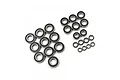 A collection of various sized rubber shielded ball bearings arranged on a white background.