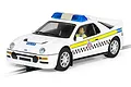 A 1/32 scale Scalextric Ford RS200 slot car in white police livery with blue light bar, yellow side stripes, and checkerboard decals on a track.
