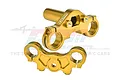 A set of two gold-anodized aluminium triple clamp parts for an RC motorcycle, featuring GPM Racing branding.