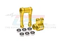 GPM Racing gold anodized aluminium C-hub and pull rod set with six included ball bearings on a white background.