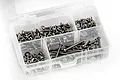 A clear plastic compartment box filled with various stainless steel RC screws, nuts, and washers.