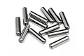 A collection of twelve small, cylindrical metal drive pins scattered on a white background.