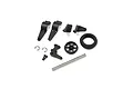 Kyosho wheelie bar set components including plastic arms, a wheel, rubber tire, metal axle, and small hardware.