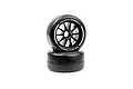 Two Volante Formula 1 RC front slick tyres on black rims stacked on a white background.