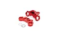 A set of red anodized aluminium triple clamps for an RC motorcycle, including two main fork brackets, a washer, and an O-ring on a white background.