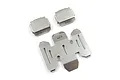 A set of three stainless steel skid plates for an RC car, featuring the Yeah Racing logo etched onto the metal surfaces.