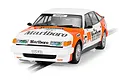 Scalextric 1/32 scale 1985 Rover SD1 slot car in white and orange Marlboro livery on a track.