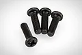 Four black metal button head screws with cross-head drives arranged on a white background.