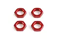 Four red anodized aluminium wheel nuts arranged in a square pattern on a white background.