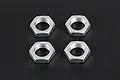 Four silver aluminium hexagonal wheel nuts arranged in a two-by-two grid on a dark background.