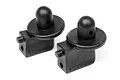 Two black plastic RC car body mounts with a cylindrical post and circular base, shown against a white background.