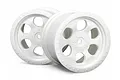 Two white HPI 6-spoke RC monster truck wheels shown at an angle against a white background.