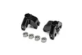 Two black aluminium steering hubs marked L and R, accompanied by four metal ball bearings, isolated on a white background.