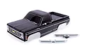 A black Traxxas 1979 Chevrolet K10 RC truck body shell with chrome bumpers on a white background.