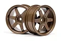 Two bronze-colored HPI TE37 style RC car rims with a 6-spoke design, shown against a white background.