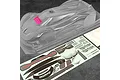A clear, unpainted Bittydesign ARES-1 1/10 scale RC car body shell with a matching decal sheet on a dark textured surface.