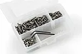 A clear plastic compartment box filled with various stainless steel RC screws, nuts, and two black L-shaped hex keys.
