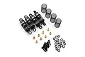 A set of four black aluminium RC shock absorbers with extra springs, brass spacers, screws, and O-rings on a white background.