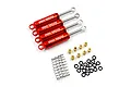 Four red aluminium Yeah Racing internal shock absorbers with silver shafts, accompanied by brass spacers, springs, and black rubber O-rings on a white background.