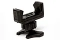 A black plastic smartphone mount for a Spektrum DX2E Active transmitter, featuring an adjustable clamp and a base attachment mechanism.