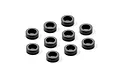 Ten small black cylindrical aluminium shims arranged on a white background.