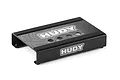 A black Hudy aluminium RC car stand with rubber grip strips and Hudy branding, viewed from a high angle on a white background.