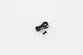 A black brass servo horn and a small black screw isolated on a white background.