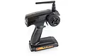 FlySky FS-GT2 2.4GHz 2-channel pistol grip RC transmitter in black, featuring a steering wheel, trigger, and antenna, set against a white background.