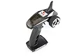 FlySky FS-GT2B 2.4GHz 3-channel pistol grip RC transmitter in black with a chrome steering wheel, viewed from a high angle.