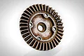 A metal 38T differential bevel gear for an RC car, shown from an angled perspective against a white background.