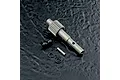 MST aluminium 20T main shaft gear with included screws, washers, and a pin on a textured black surface.