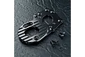 Black anodized aluminium motor mount for RC cars with cooling fins, accompanied by four small black screws and two washers on a dark textured surface.