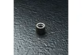 A small metallic 22-tooth idler gear for an RC car, shown from a top-down angle on a dark, textured surface.