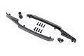 Traxxas roof skid plate set including two long black plastic rails, two small mounting brackets, and eight black screws on a white background.